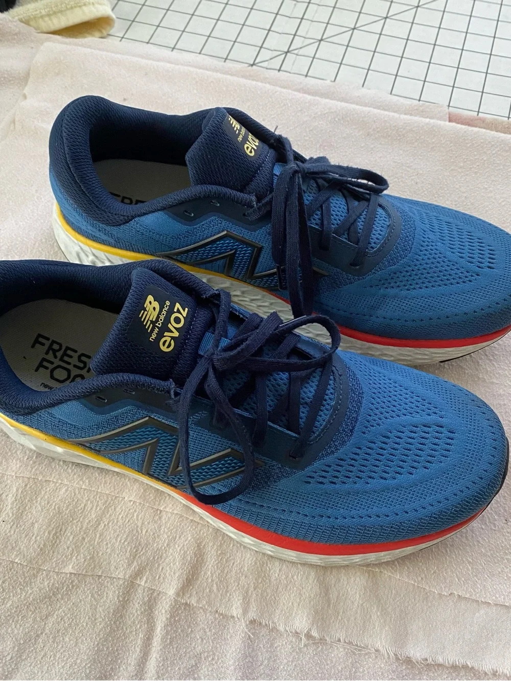 New Balance EvoZ Men's Blue and Navy Athletic Running Shoes with Red Accent